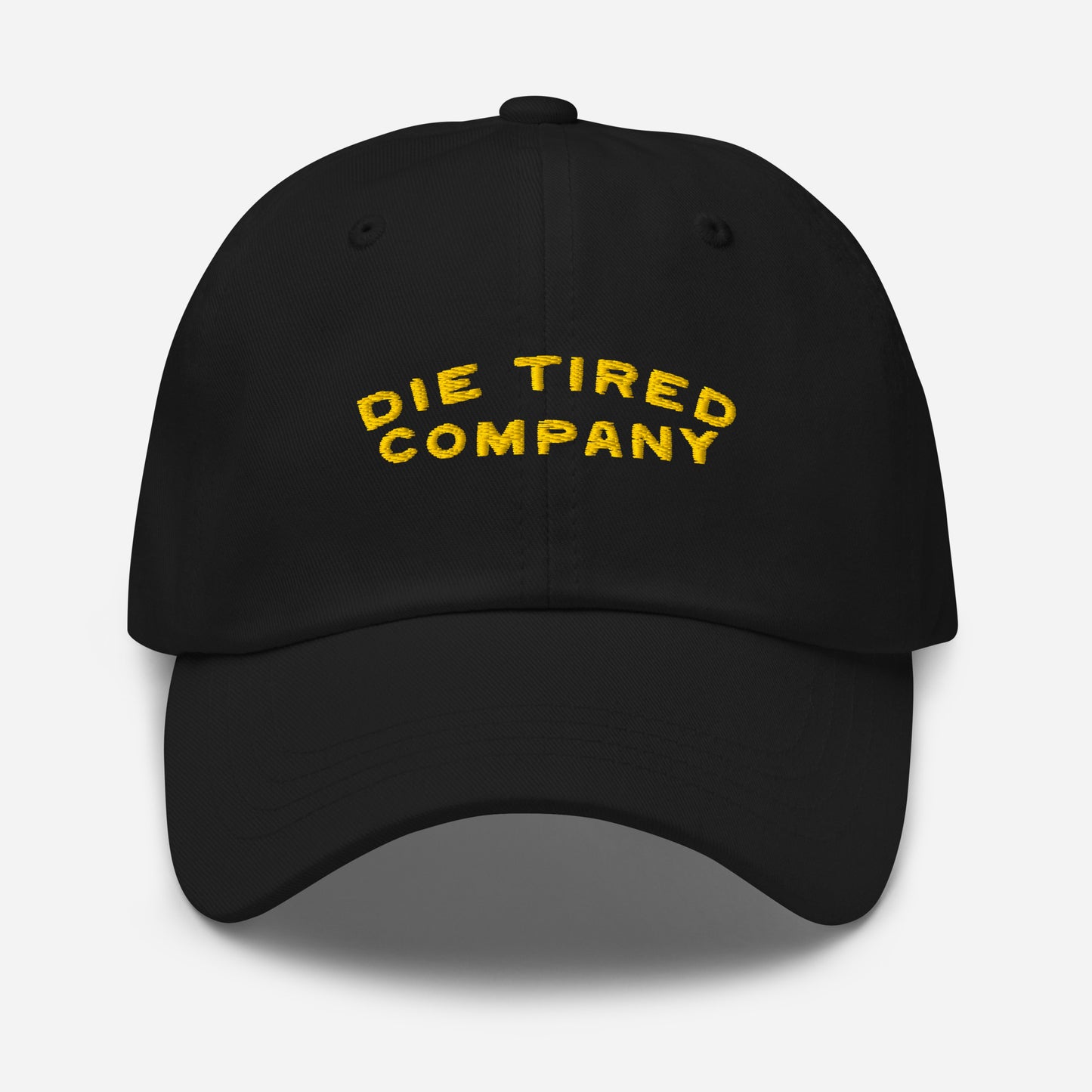 Die Tired Company dad hat baseball cap in black with golden embroidered logo on the front