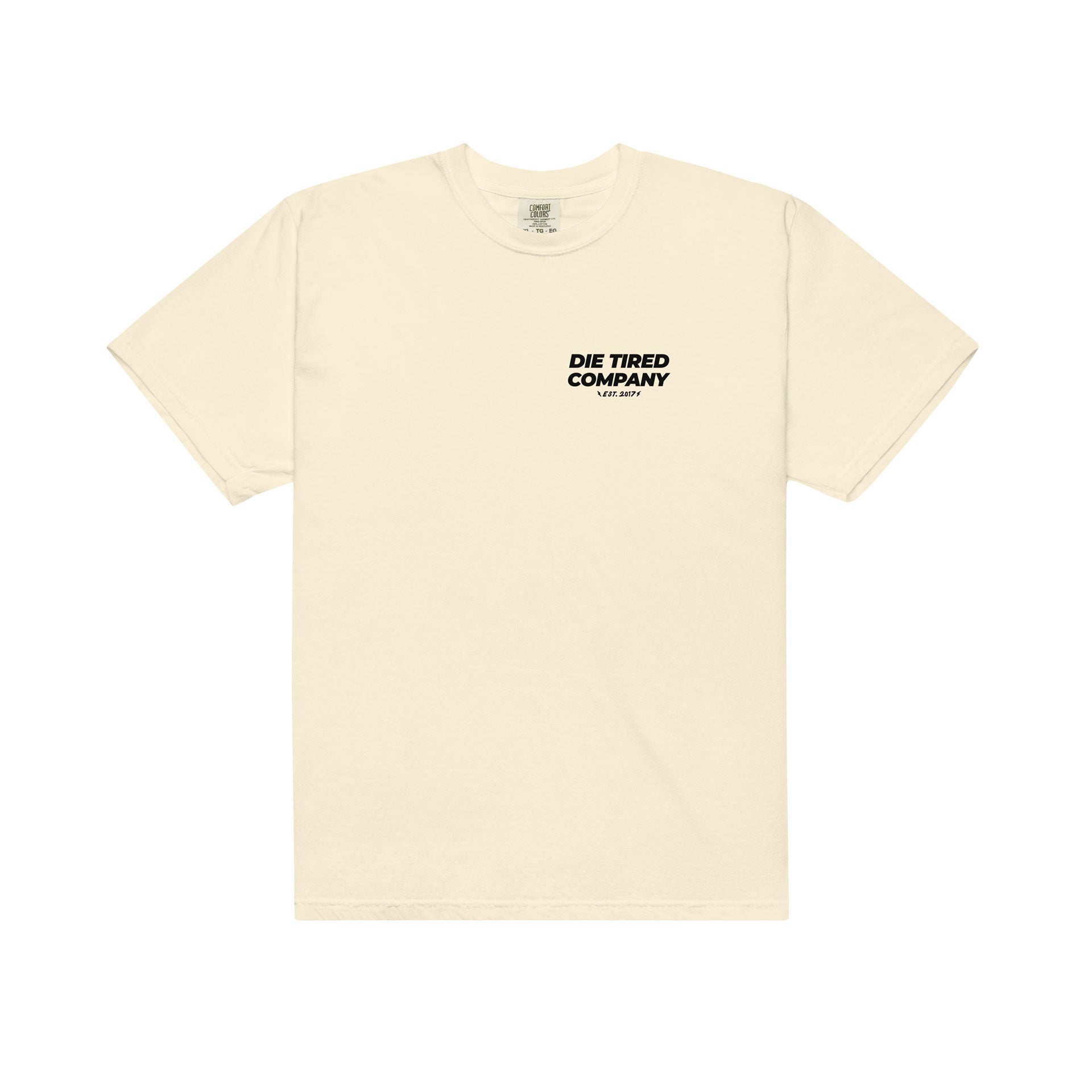 A cream-colored short-sleeve t-shirt with 'DIE TIRED COMPANY' printed in black text on the left chest, displayed flat against a solid white background.